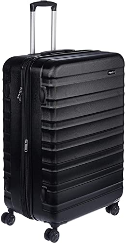 Amazon Basics - Maleta de viaje rígidaa giratoria - 78 cm, grande, Negro